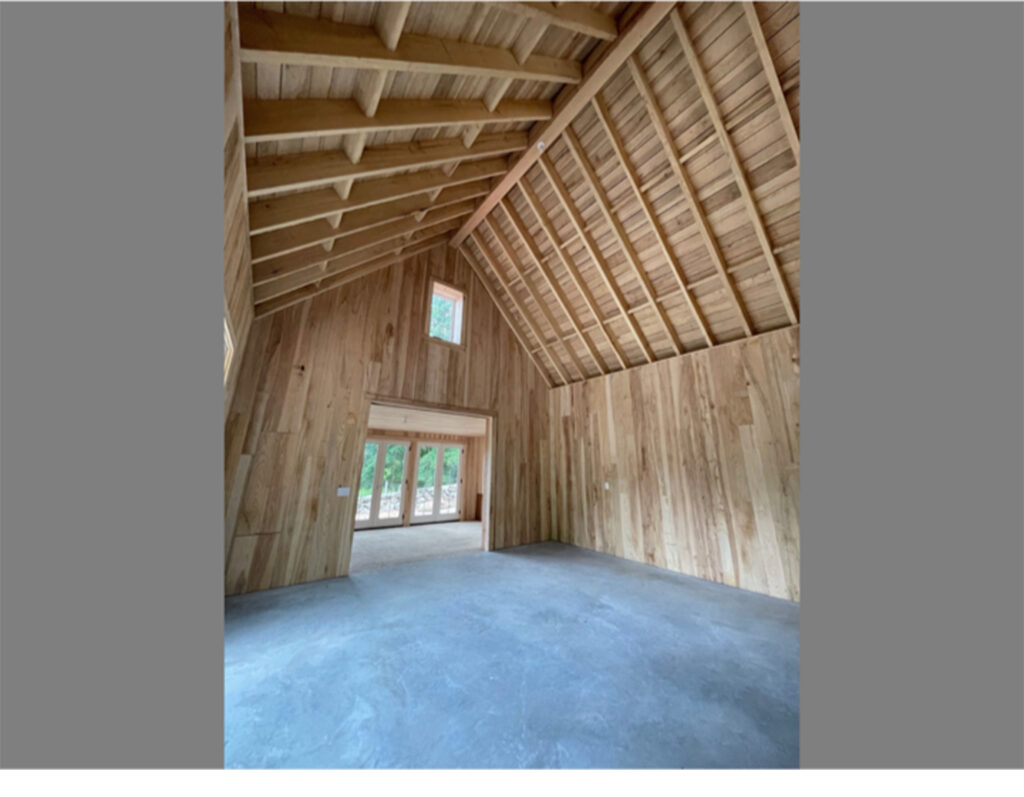 A look into an interior of a barn built from ash trees that had died from an infestation of emerald ash borer.