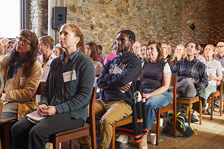 Managing Meadows symposium attendees listening to the panels