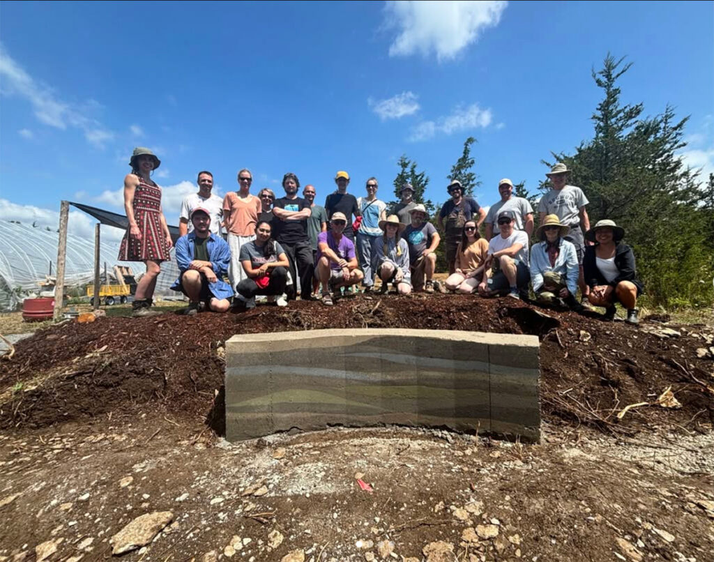 A rammed earth retaining wall at Dropseed nursery in Canada